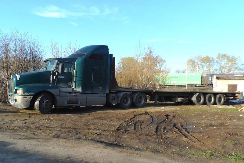 2 Semi-Trailers Trucks make for almost 100 feet